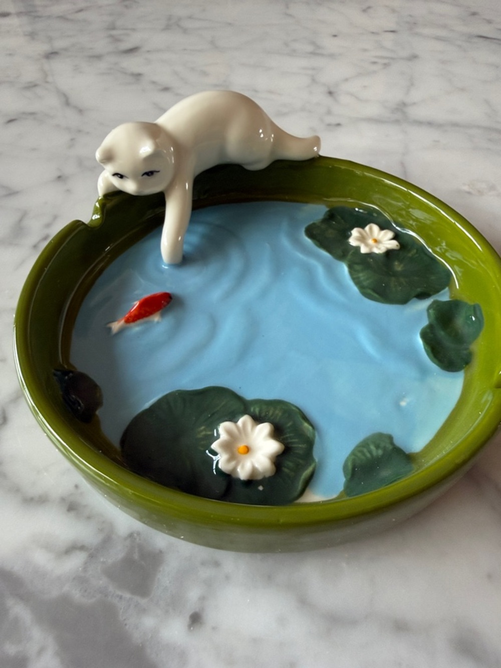 Cute white kitty and fish pond ashtray from urban outfitters. New. Great gift!